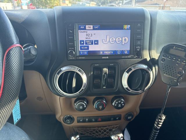 used 2012 Jeep Wrangler Unlimited car, priced at $21,275