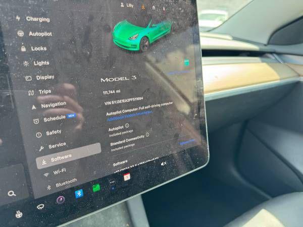 used 2023 Tesla Model 3 car, priced at $18,995