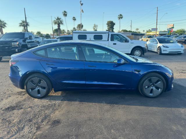 used 2023 Tesla Model 3 car, priced at $25,995