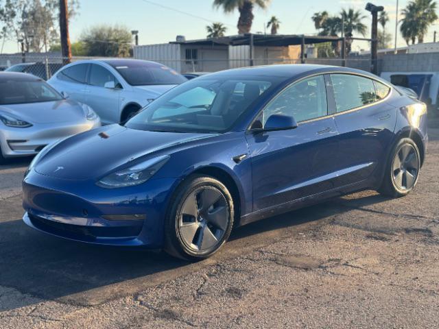 used 2023 Tesla Model 3 car, priced at $25,995