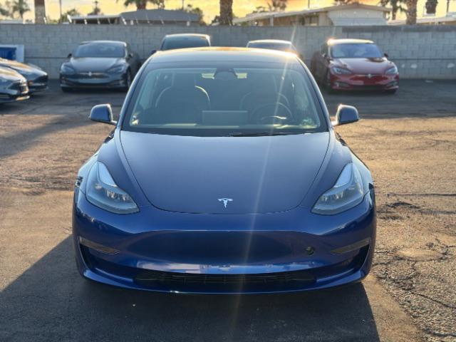 used 2023 Tesla Model 3 car, priced at $25,995