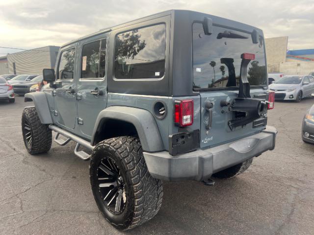 used 2015 Jeep Wrangler Unlimited car, priced at $22,995