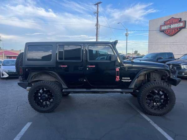 used 2013 Jeep Wrangler Unlimited car, priced at $17,995
