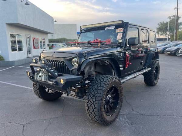 used 2013 Jeep Wrangler Unlimited car, priced at $17,995