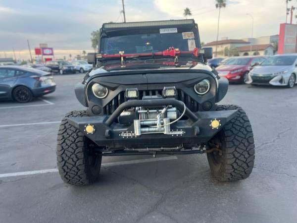 used 2013 Jeep Wrangler Unlimited car, priced at $17,995