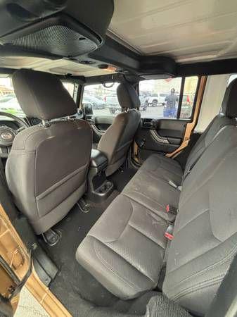 used 2015 Jeep Wrangler Unlimited car, priced at $13,995