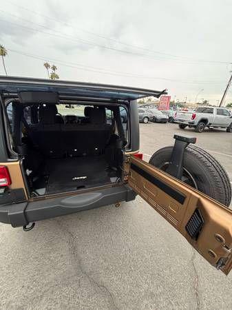 used 2015 Jeep Wrangler Unlimited car, priced at $13,995