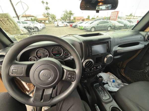 used 2015 Jeep Wrangler Unlimited car, priced at $13,995