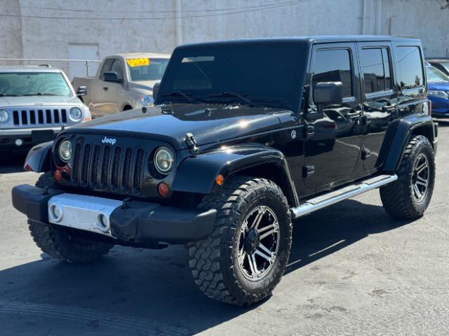 used 2013 Jeep Wrangler Unlimited car, priced at $18,995