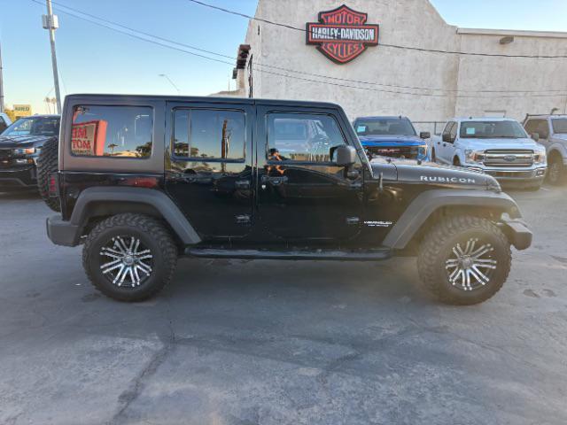 used 2012 Jeep Wrangler Unlimited car, priced at $16,995