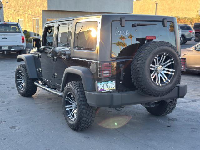 used 2012 Jeep Wrangler Unlimited car, priced at $16,995