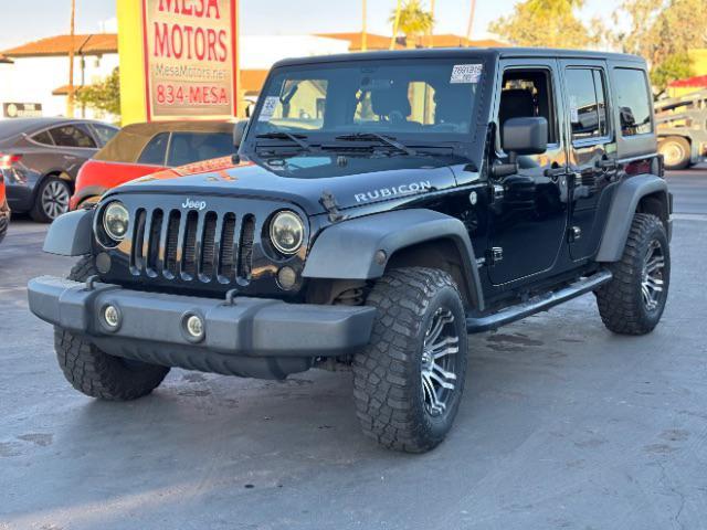 used 2012 Jeep Wrangler Unlimited car, priced at $16,995