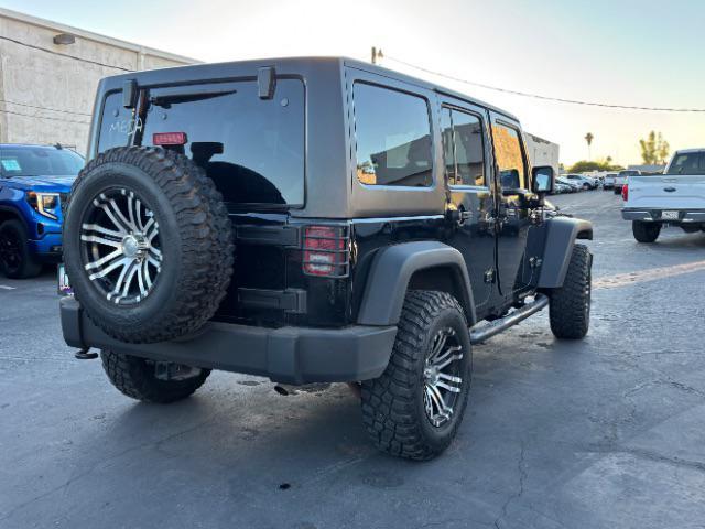used 2012 Jeep Wrangler Unlimited car, priced at $16,995