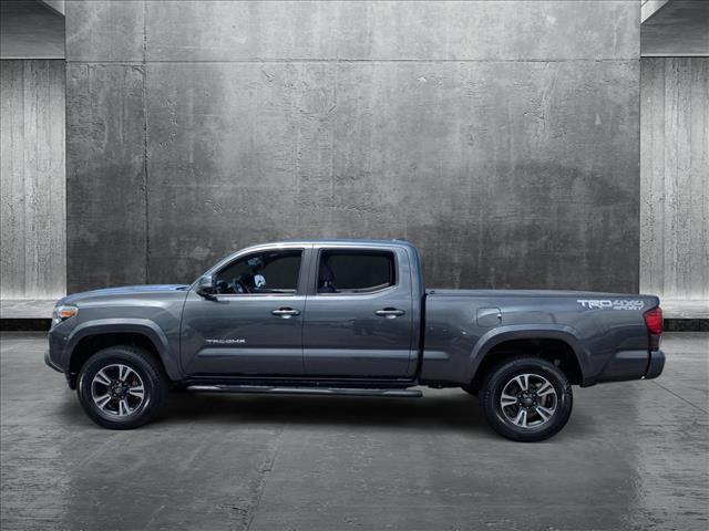 used 2019 Toyota Tacoma car, priced at $31,423
