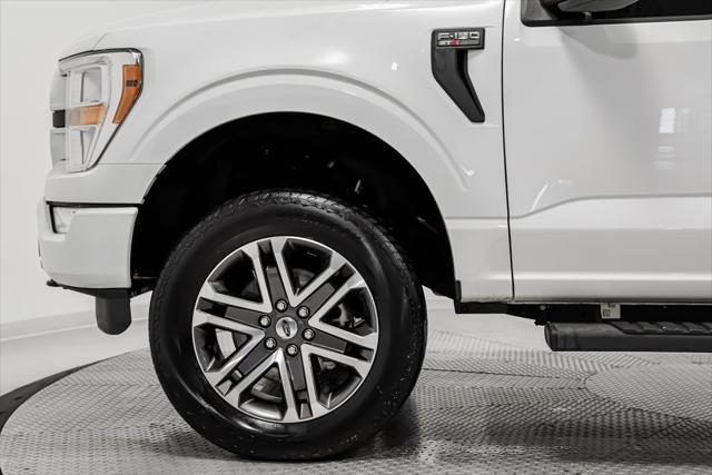 used 2021 Ford F-150 car, priced at $32,424