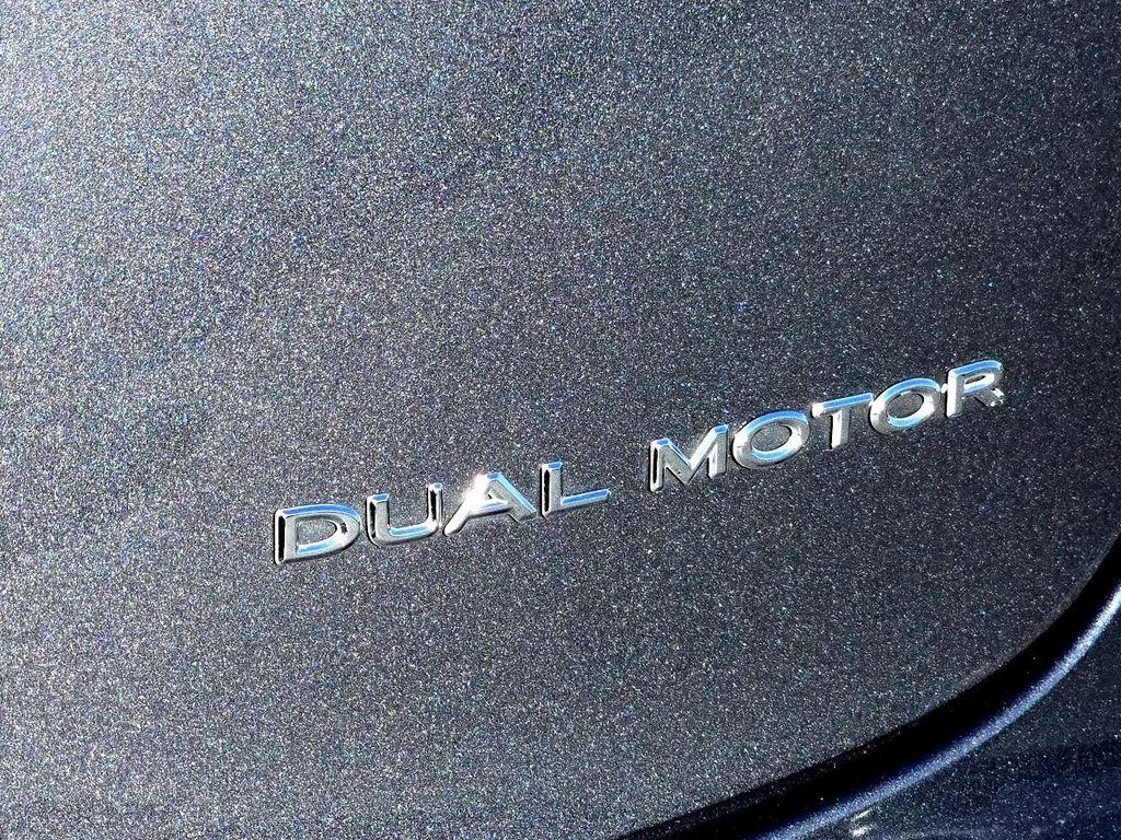 used 2023 Tesla Model 3 car, priced at $27,700