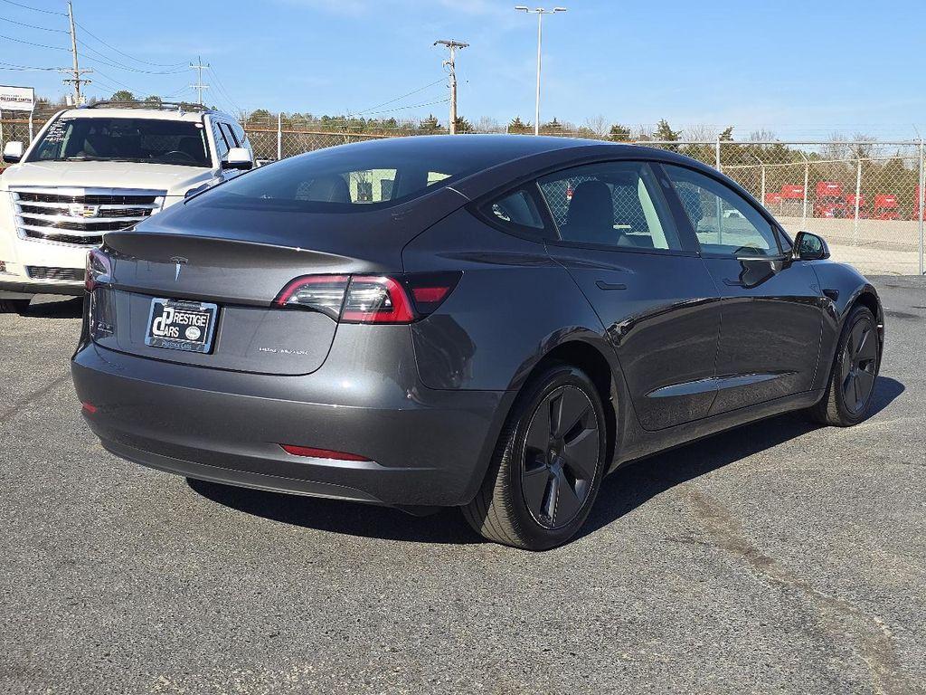 used 2023 Tesla Model 3 car, priced at $27,850