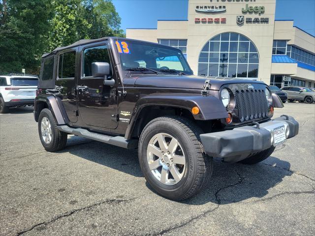 used 2013 Jeep Wrangler Unlimited car, priced at $15,893