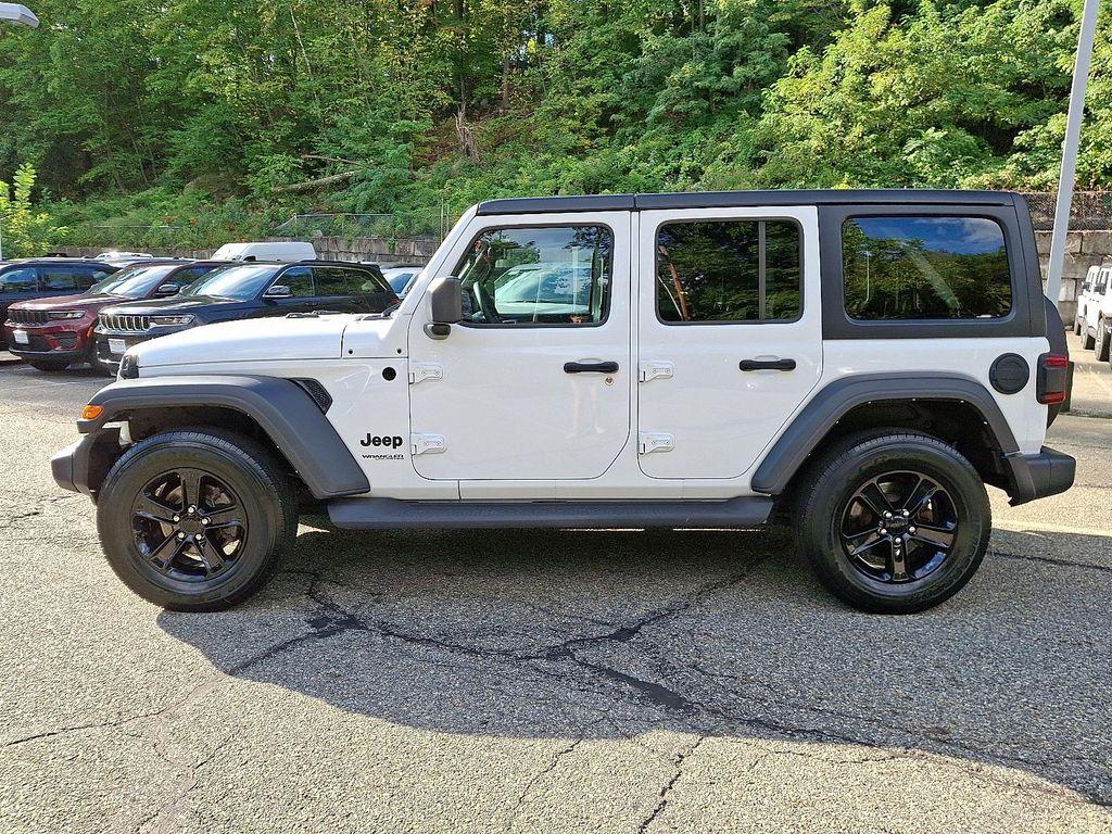 used 2021 Jeep Wrangler Unlimited car, priced at $34,921