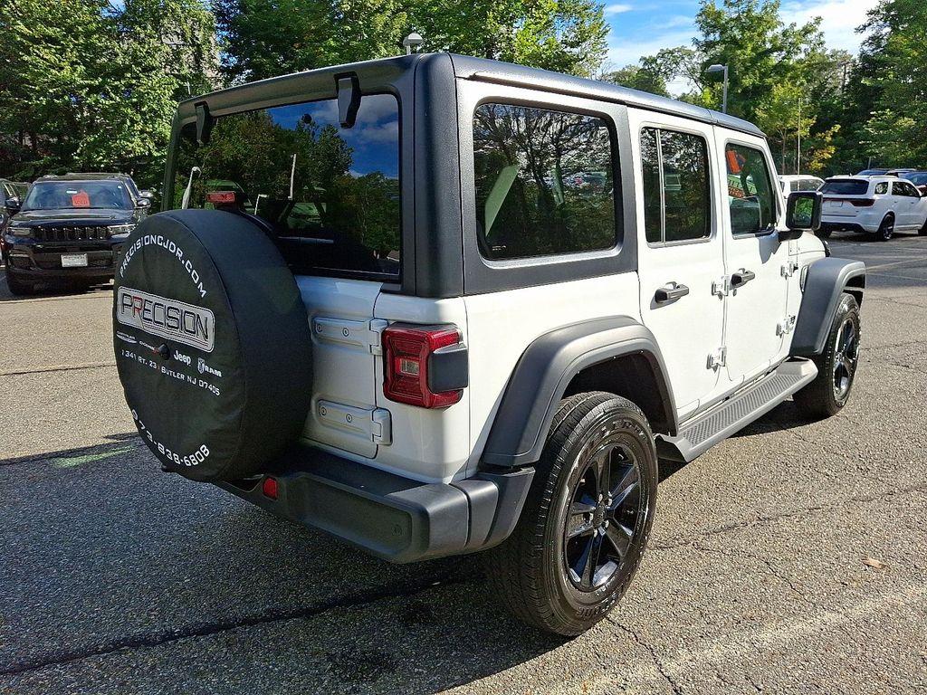 used 2021 Jeep Wrangler Unlimited car, priced at $34,921
