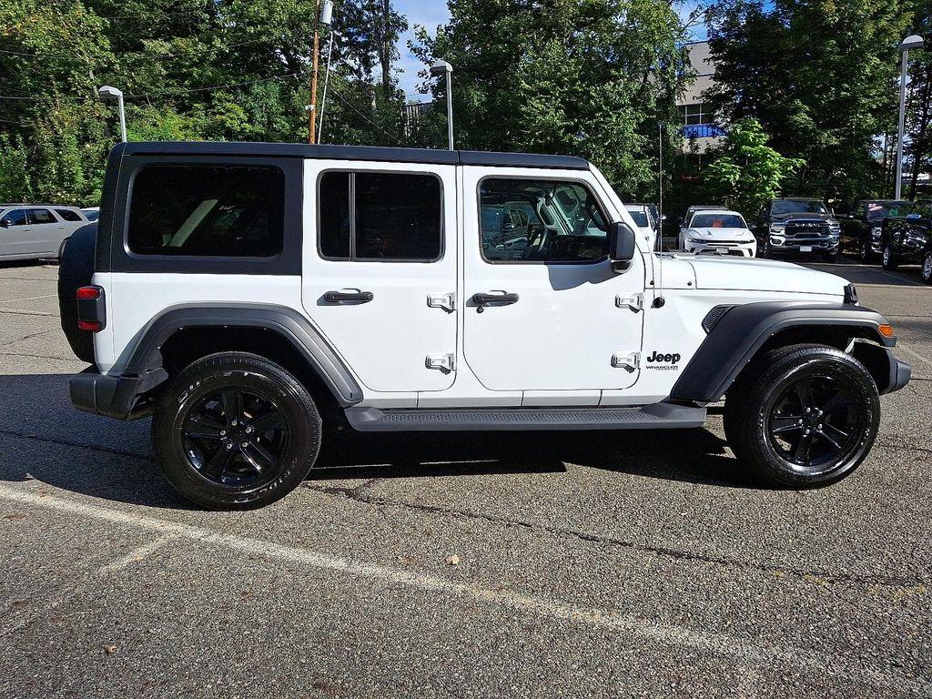 used 2021 Jeep Wrangler Unlimited car, priced at $34,921