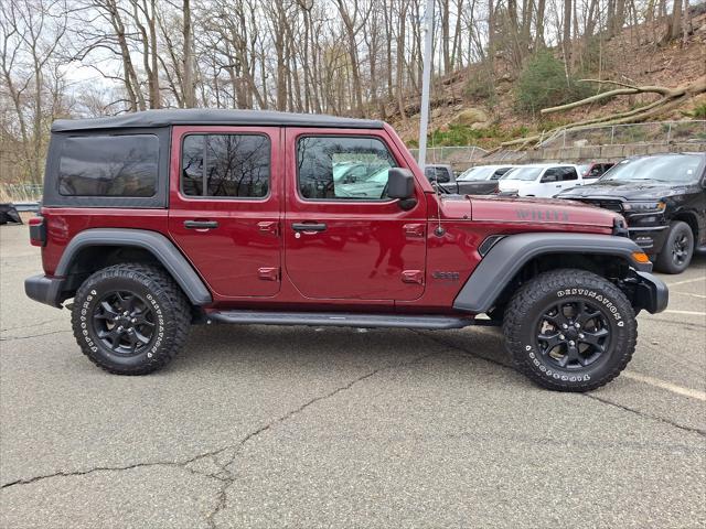 used 2021 Jeep Wrangler car, priced at $33,821