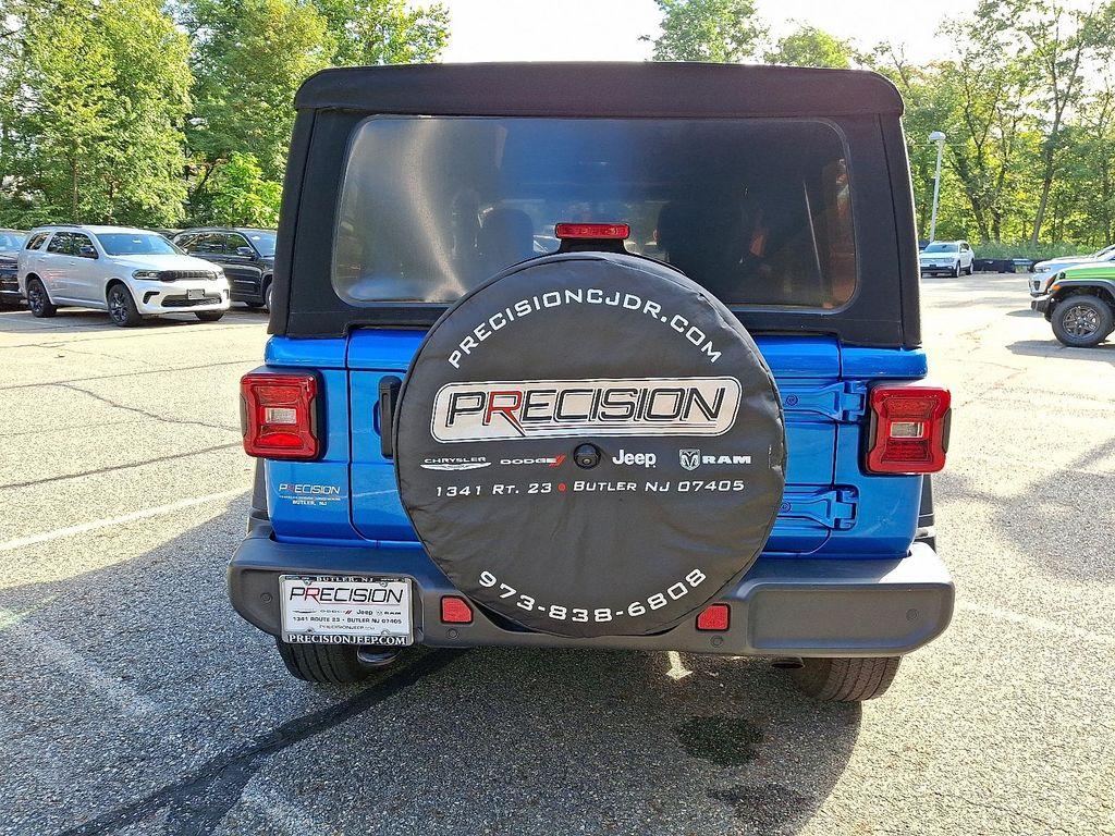 used 2021 Jeep Wrangler Unlimited car, priced at $34,931