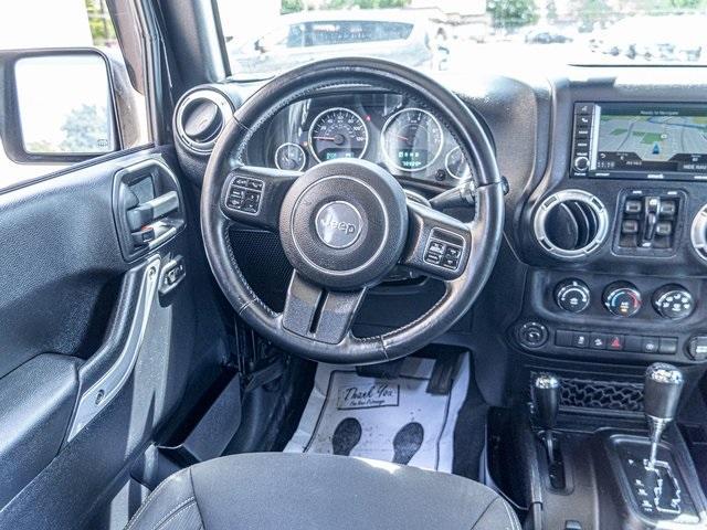 used 2015 Jeep Wrangler Unlimited car, priced at $21,819