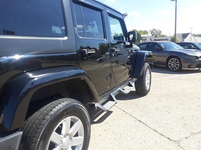 used 2015 Jeep Wrangler Unlimited car, priced at $21,819