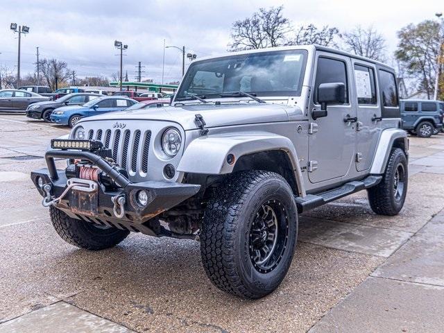 used 2012 Jeep Wrangler Unlimited car, priced at $15,719