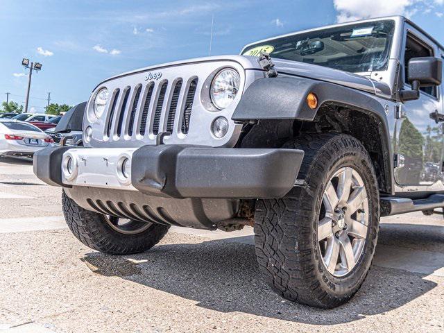 used 2015 Jeep Wrangler Unlimited car, priced at $17,569