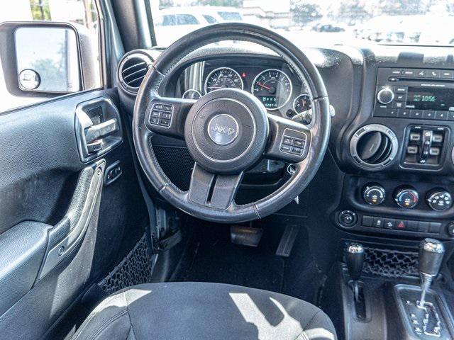 used 2015 Jeep Wrangler Unlimited car, priced at $17,569