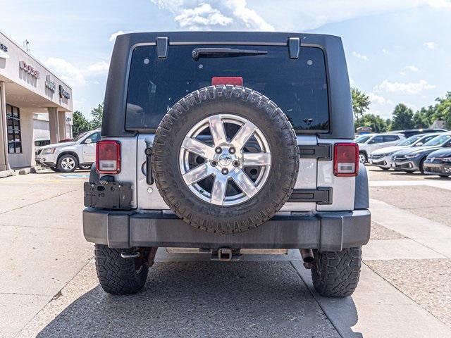 used 2015 Jeep Wrangler Unlimited car, priced at $17,569