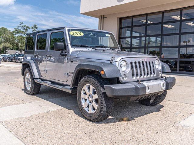 used 2015 Jeep Wrangler Unlimited car, priced at $17,569