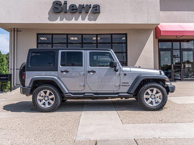 used 2015 Jeep Wrangler Unlimited car, priced at $17,569