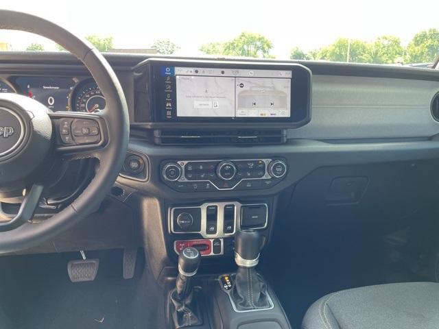used 2024 Jeep Wrangler car, priced at $38,589