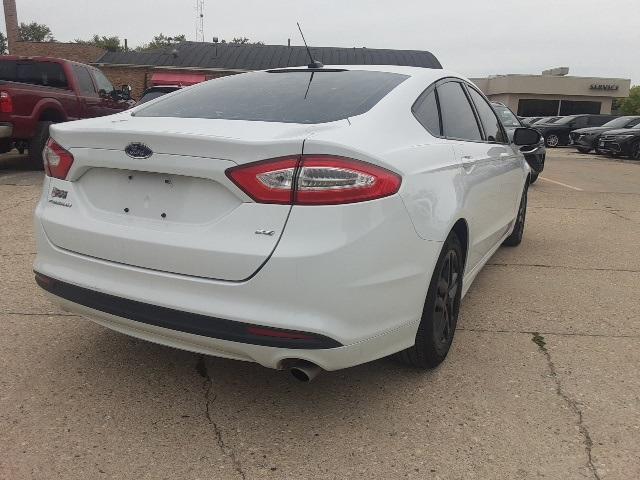 used 2014 Ford Fusion car, priced at $9,989