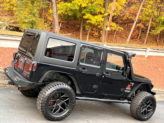 used 2011 Jeep Wrangler Unlimited car, priced at $17,900