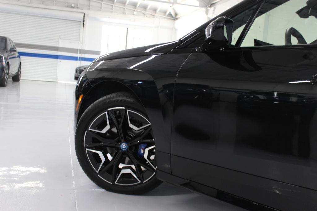 used 2024 BMW iX car, priced at $71,998