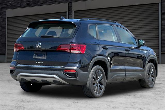 used 2023 Volkswagen Taos car, priced at $18,495