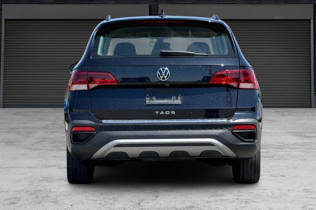 used 2023 Volkswagen Taos car, priced at $18,495