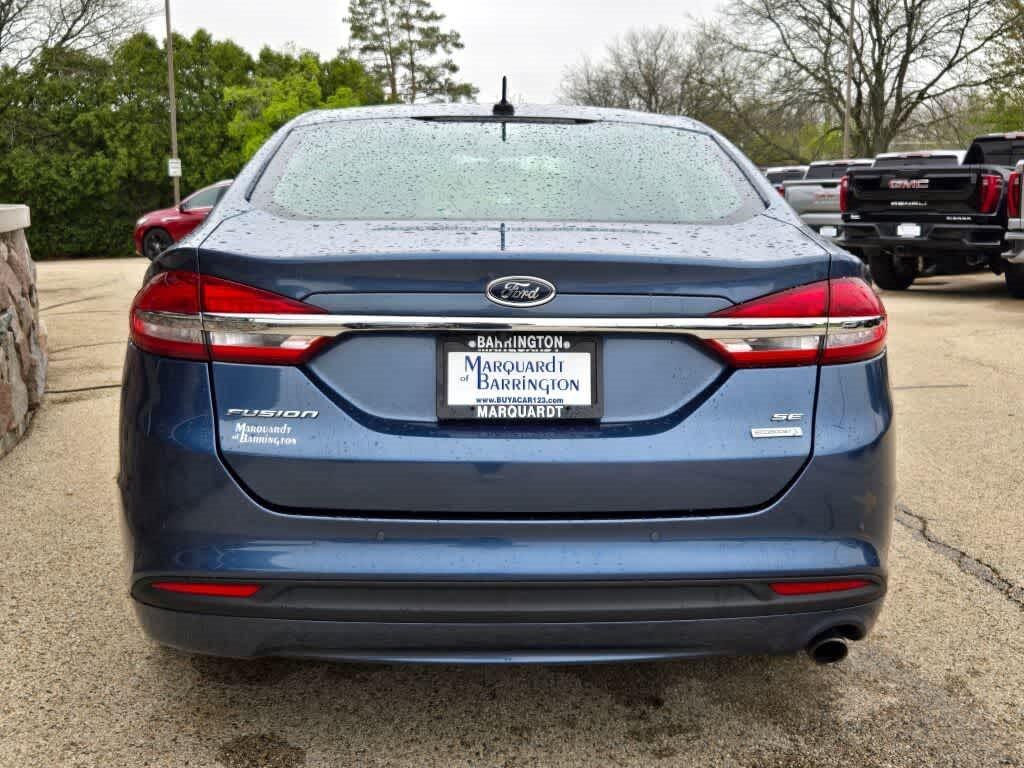 used 2018 Ford Fusion car, priced at $12,495