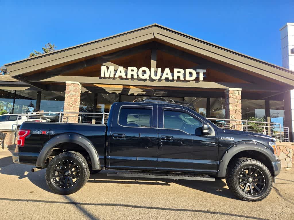 used 2018 Ford F-150 car, priced at $22,995