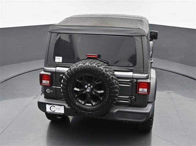 used 2021 Jeep Wrangler Unlimited car, priced at $32,544