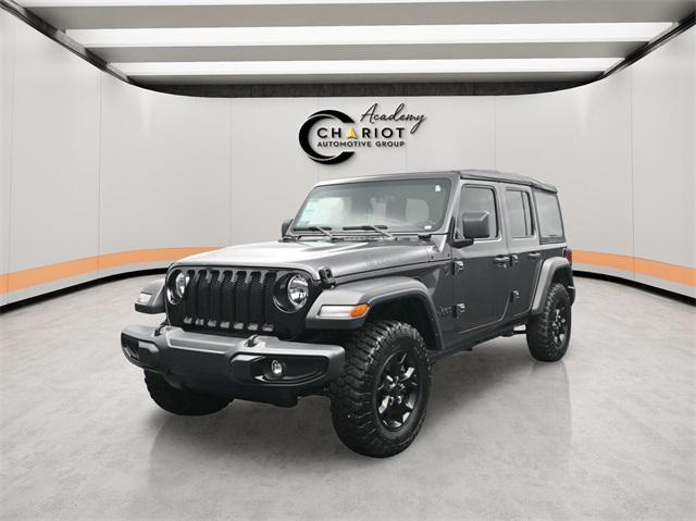 used 2021 Jeep Wrangler Unlimited car, priced at $32,544