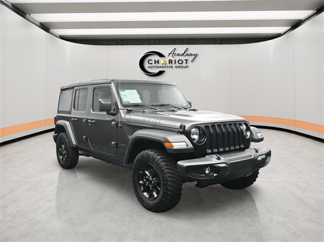 used 2021 Jeep Wrangler Unlimited car, priced at $32,544