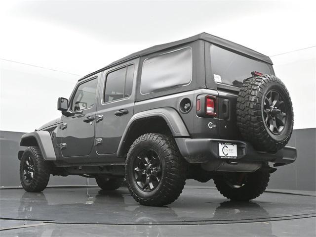 used 2021 Jeep Wrangler Unlimited car, priced at $32,544