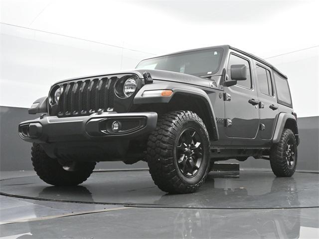 used 2021 Jeep Wrangler Unlimited car, priced at $32,544