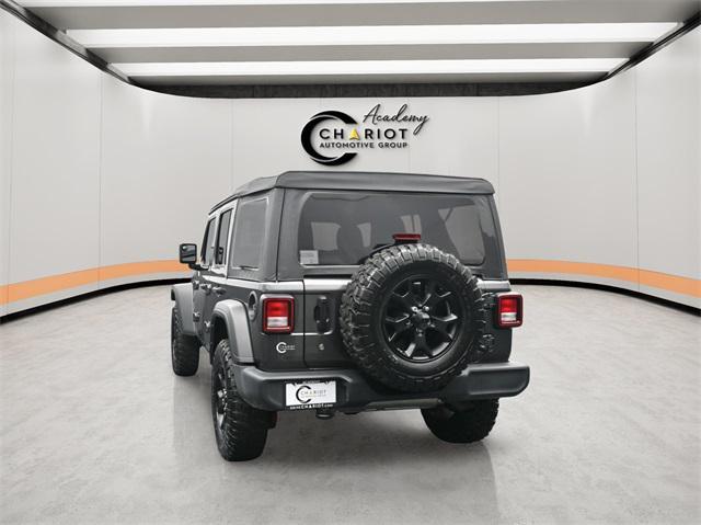 used 2021 Jeep Wrangler Unlimited car, priced at $32,544