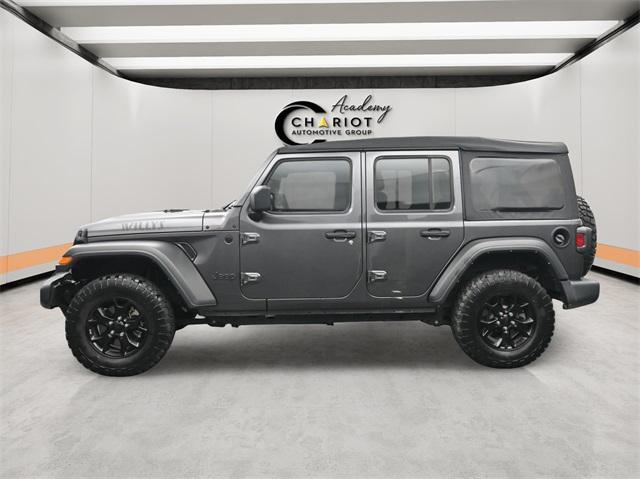 used 2021 Jeep Wrangler Unlimited car, priced at $32,544